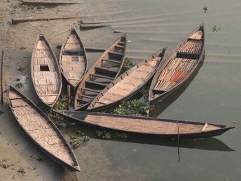 High angle view of old boat moored in river 