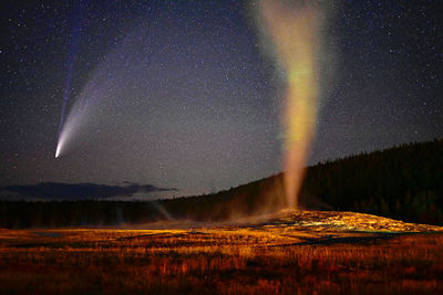 Scenic view of star field against sky at night