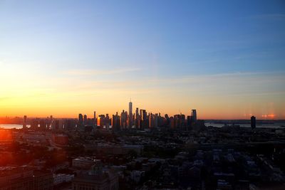 View of cityscape against sky during sunset