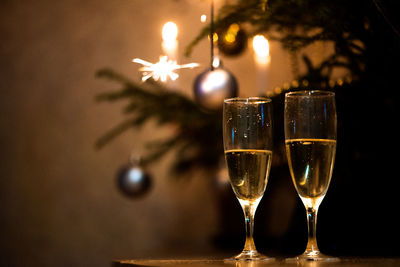 Close-up of champagne flutes on table