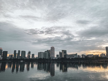 Buildings in city against sky