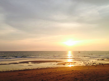 Scenic view of sea at sunset