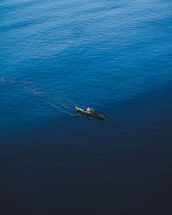 High angle view of man surfing in sea