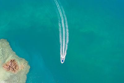 Sail boat on the sea aerial top view in thailand