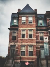 Low angle view of old building against sky