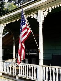 Low angle view of flag against building