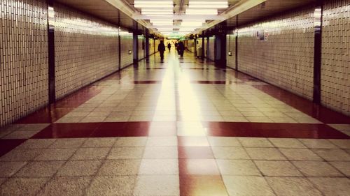 Man in illuminated corridor