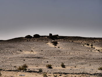 Scenic view of desert against clear sky