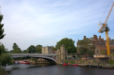 Bridge over river against sky