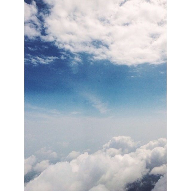 transfer print, sky, cloud - sky, beauty in nature, scenics, tranquility, tranquil scene, cloudy, auto post production filter, nature, cloud, cloudscape, low angle view, idyllic, sky only, blue, day, outdoors, no people, weather