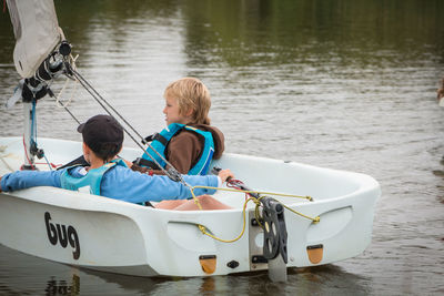 People on boat in lake