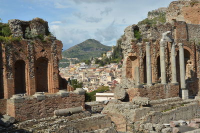 Panoramic view of old ruins against sky