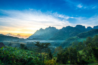 Scenic view of mountains against sky during sunset