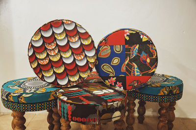 A collection of decorated stools 