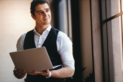 Young man using mobile phone