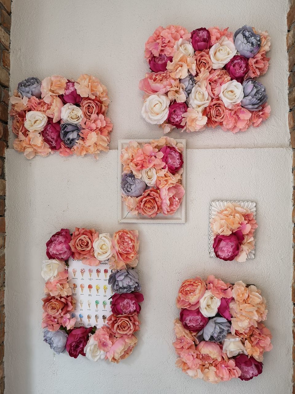 DIRECTLY ABOVE SHOT OF MULTI COLORED ROSES ON PINK BOARD