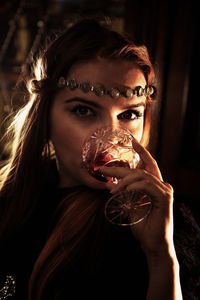 Portrait of woman holding ice cream