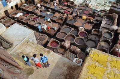 High angle view of people at traditional dyeing pits