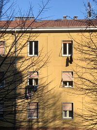 Residential building windows against sky