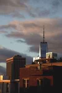 Low angle view of building against sky during sunset