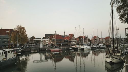 Boats moored at harbor