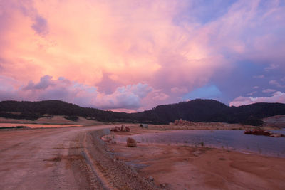 Panoramic view of road against sky during sunset