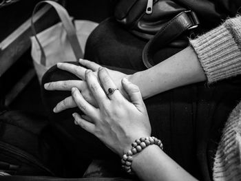 Close-up of couple holding hands