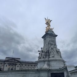 Low angle view of statue against sky