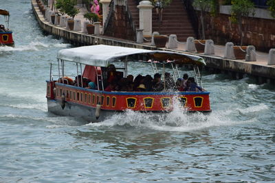 People on boat in sea