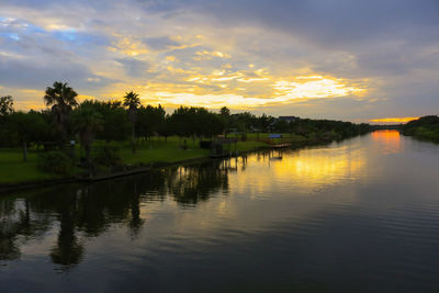 Scenic view of lake against sky during sunset