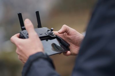 Close-up of hand holding smart phone