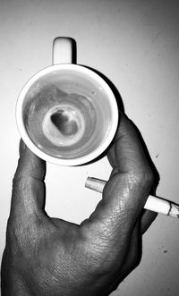 Close-up of hand holding drink