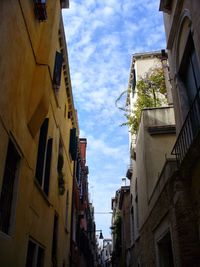 Low angle view of residential buildings against sky