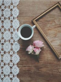 High angle view of coffee cup on table