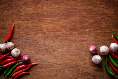 High angle view of chili peppers on table