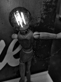 Close-up of hand holding candles