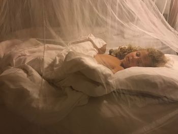 Man sleeping on bed