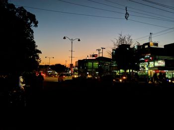 Silhouette of city at night