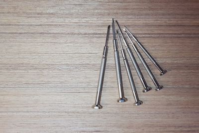 High angle view of metallic structure on table