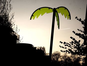 Low angle view of silhouette plant against sky