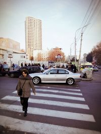 Full length of man on road in city