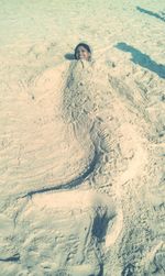 High angle view of woman on beach