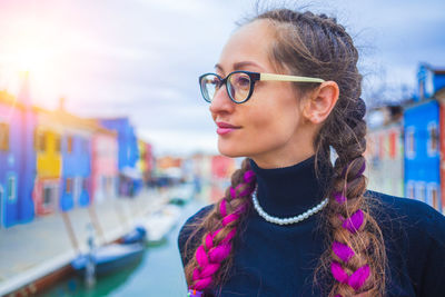 Portrait of young woman wearing sunglasses