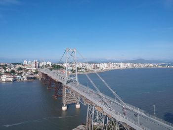 High angle view of bridge over sea against sky