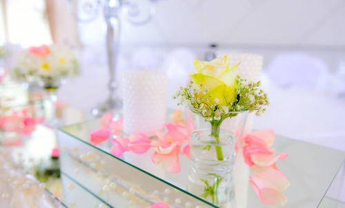 Close-up of flower vase on table