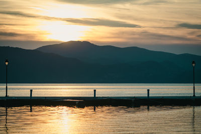 Scenic view of lake during sunset