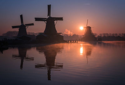 Reflection of sky on water at sunset