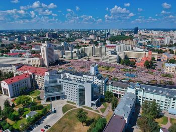 High angle view of buildings in city against sky