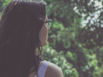 Close-up of woman with black hair