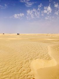 Scenic view of desert against sky